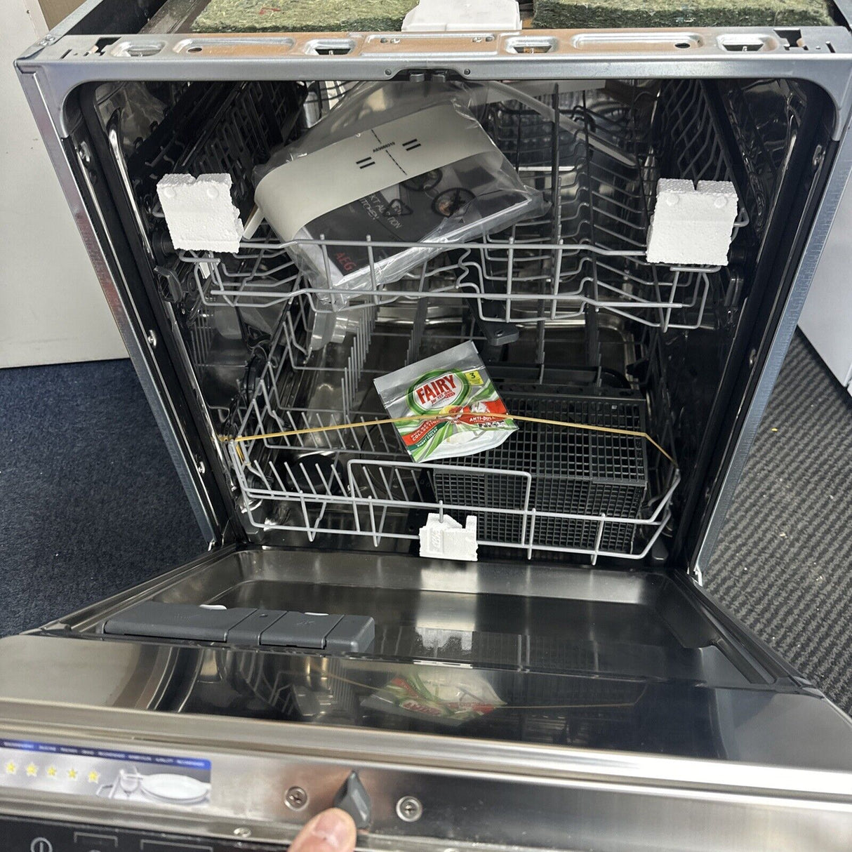 AEG FSB42607Z 3000 Air Dry Fully Integrated Built In Dishwasher - Black Control Panel with Sliding Door Fixing Kit. Shop photo with door open