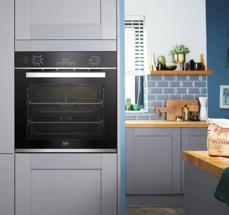 Beko Recycled Net® BBIS25300XC (83) Built-in Electric Single SimplySteam™ Oven with AeroPerfect™ - A Rated from HomeWise Appliances stock photo in a kitchen display