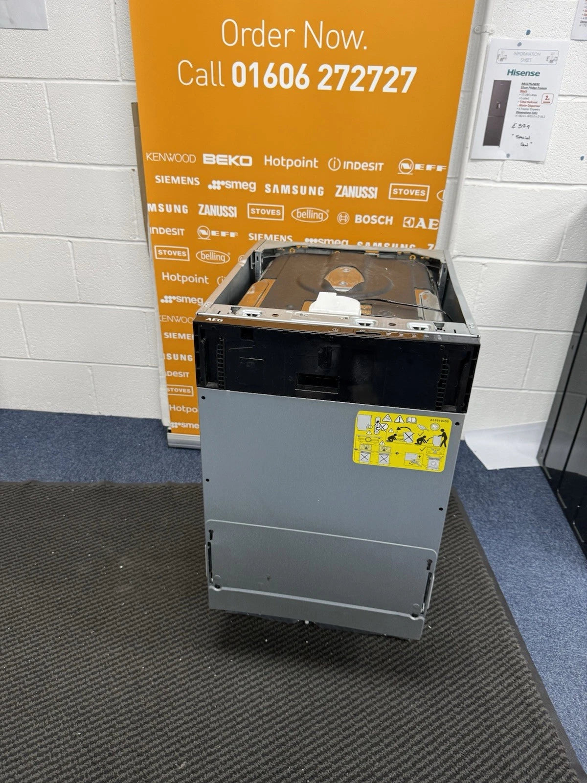 AEG FSX51407Z Series 5000 AirDry 45cm Integrated Slimline Dishwasher with Black Control Panel, F Rated from HomeWise Appliances. Shop photo of dishwasher in front of a call to action sales banner, Order Now. Call 01606 272727