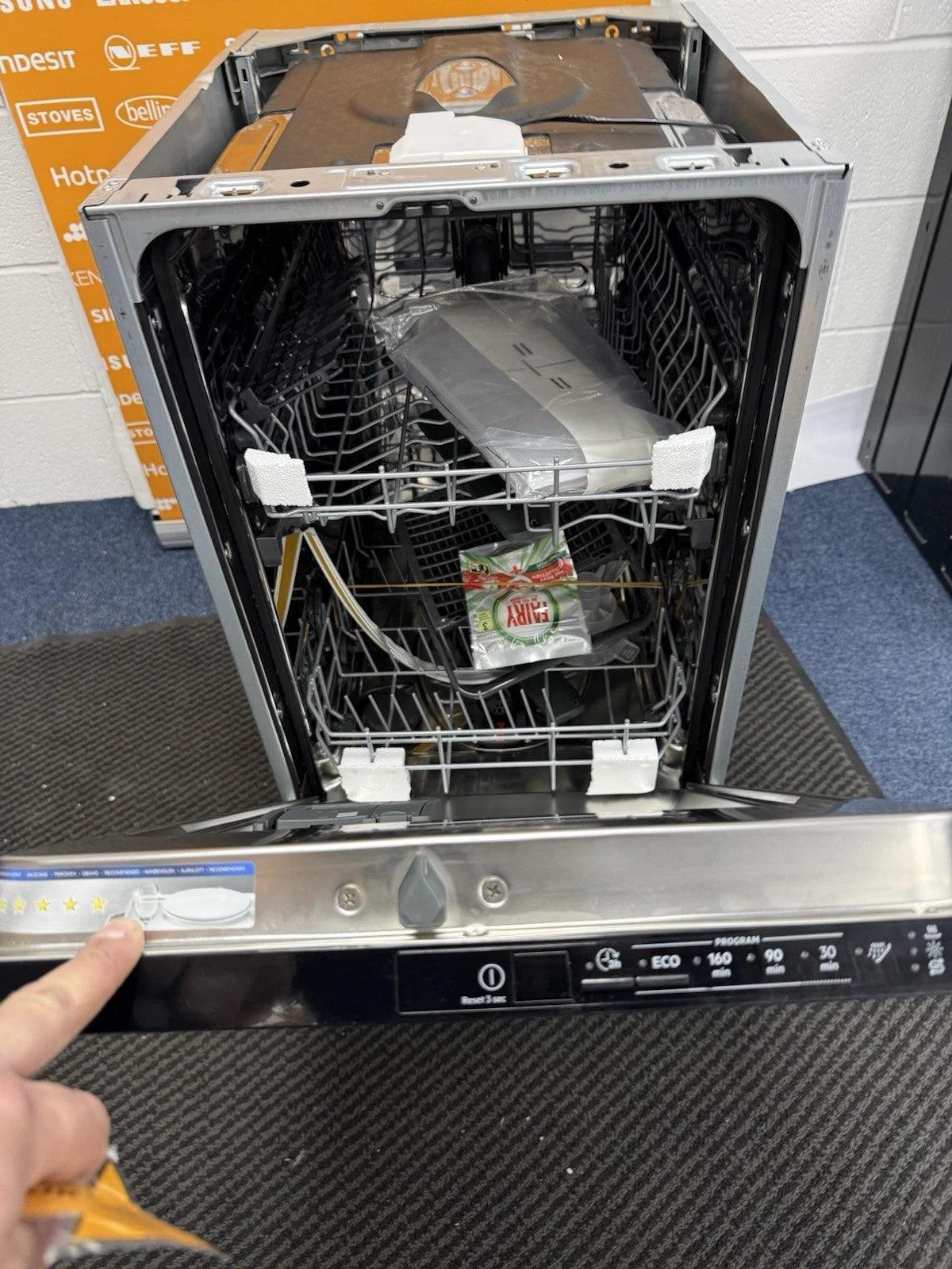 AEG FSX51407Z Series 5000 AirDry 45cm Integrated Slimline Dishwasher with Black Control Panel, F Rated from HomeWise Appliances. Shop photo close up of the door opem showing control panel