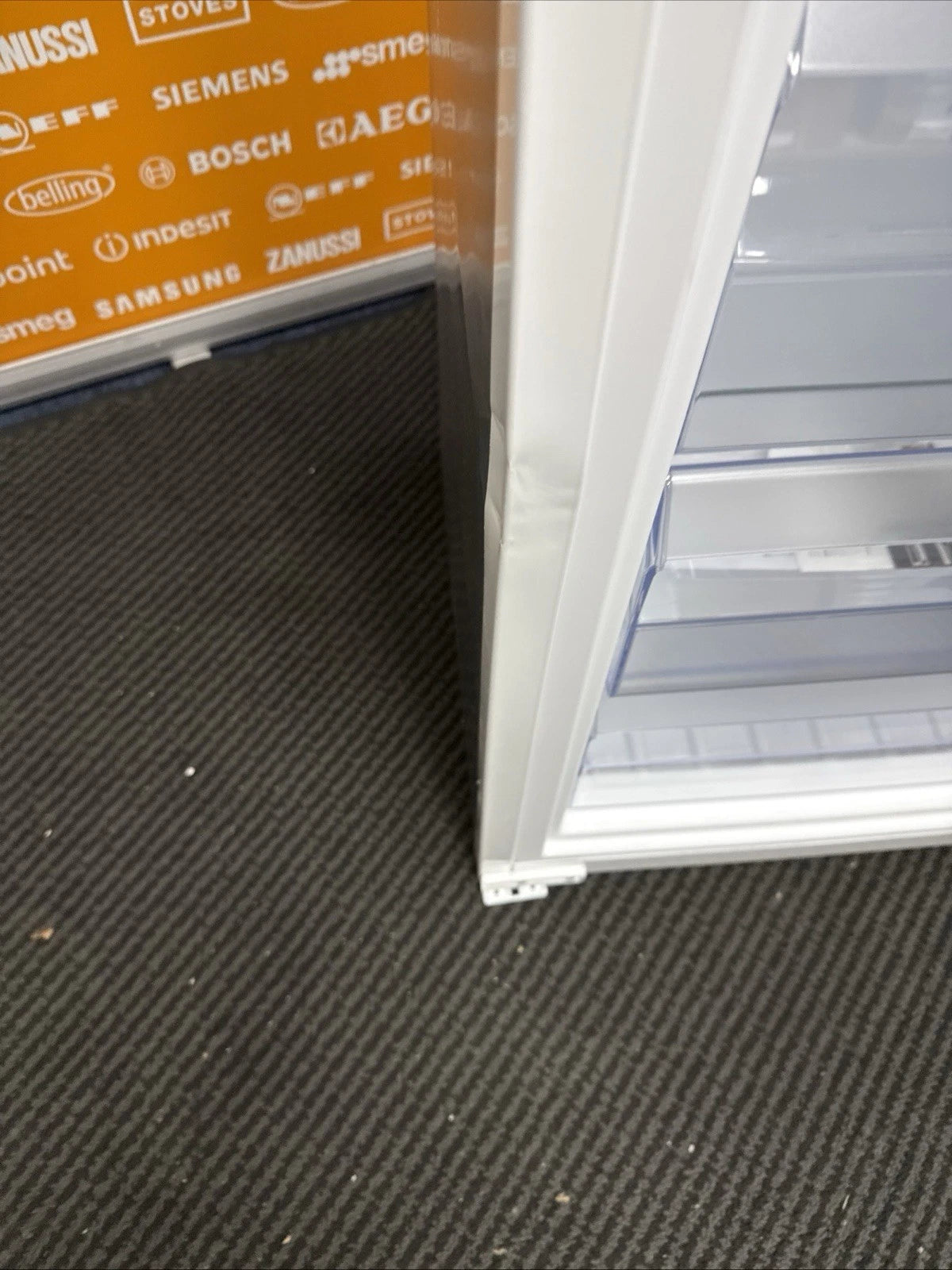 Hotpoint HTSD18F013H1 209 Litre Tall Built-In Freezer with No Frost - E Rated from HomeWise Appliances. Shop photo of the front edge of the freezer