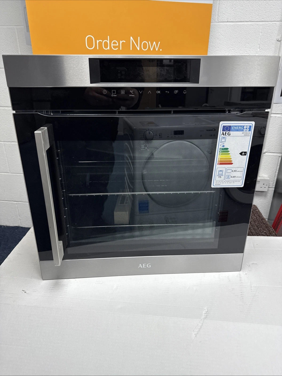 AEG BPK744R21M Built-In Single Oven with Right Side Opening Door Pyrolytic Self Cleaning in Stainless Steel - A+ Rated Showroom Photo Close up of front of oven with door closed