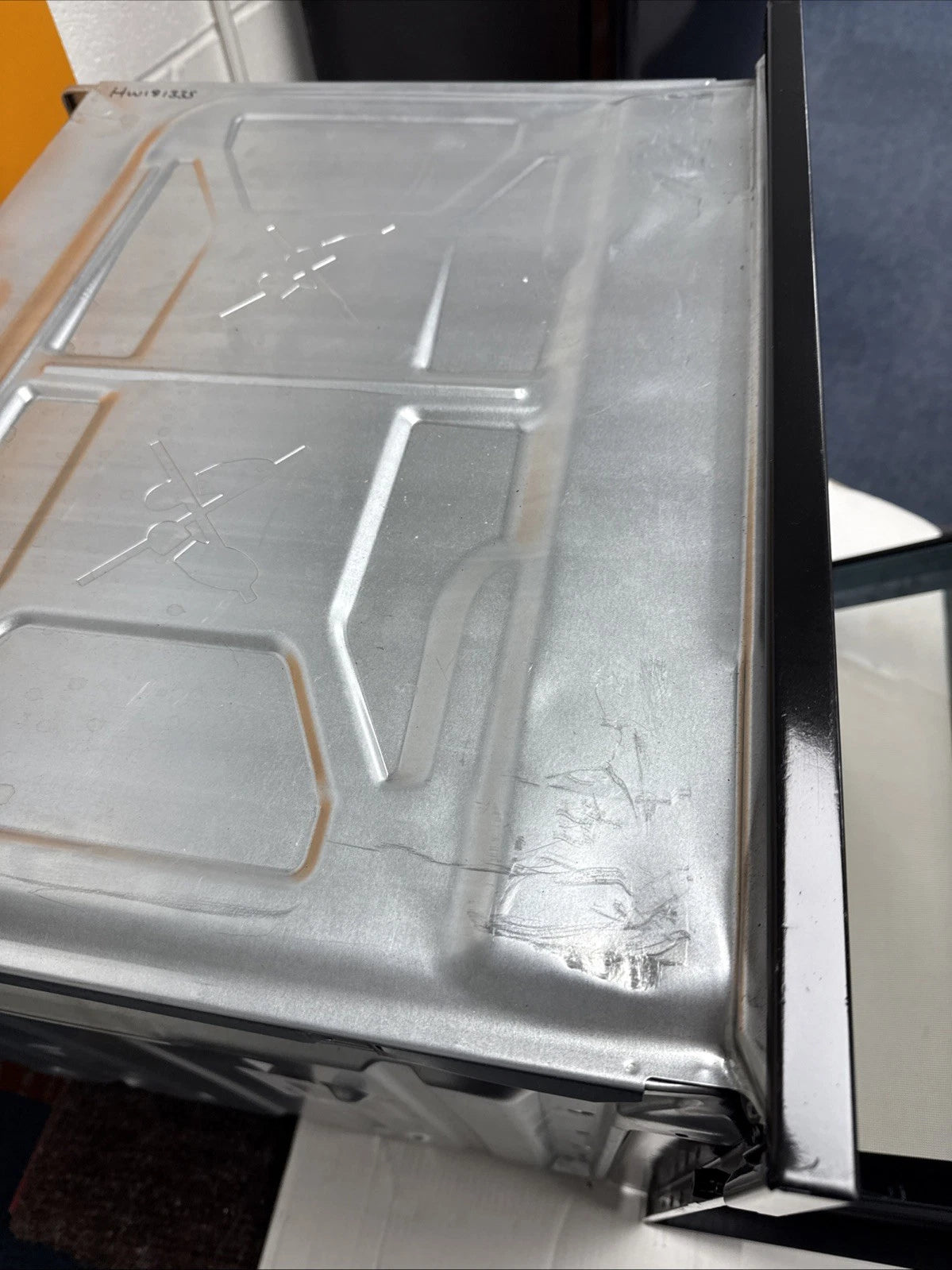 AEG BEX335011B SurroundCook Built-In Electric Single Oven in Black - A Rated showroom photo top of casing with light marks