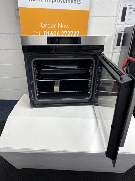 AEG BPK744R21M Built-In Single Oven with Right Side Opening Door Pyrolytic Self Cleaning in Stainless Steel - A+ Rated Showroom Photo front with door open and sales banner