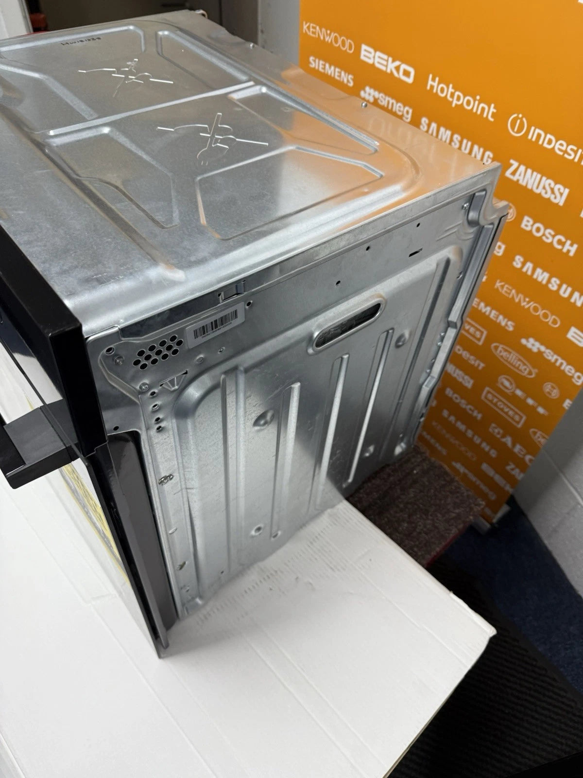 Zanussi ZOPNX6K2 Electric Single Oven with Pyrolytic Self Cleaning in Black - A+ Rated Showroom Photo top of oven casing and right side panel