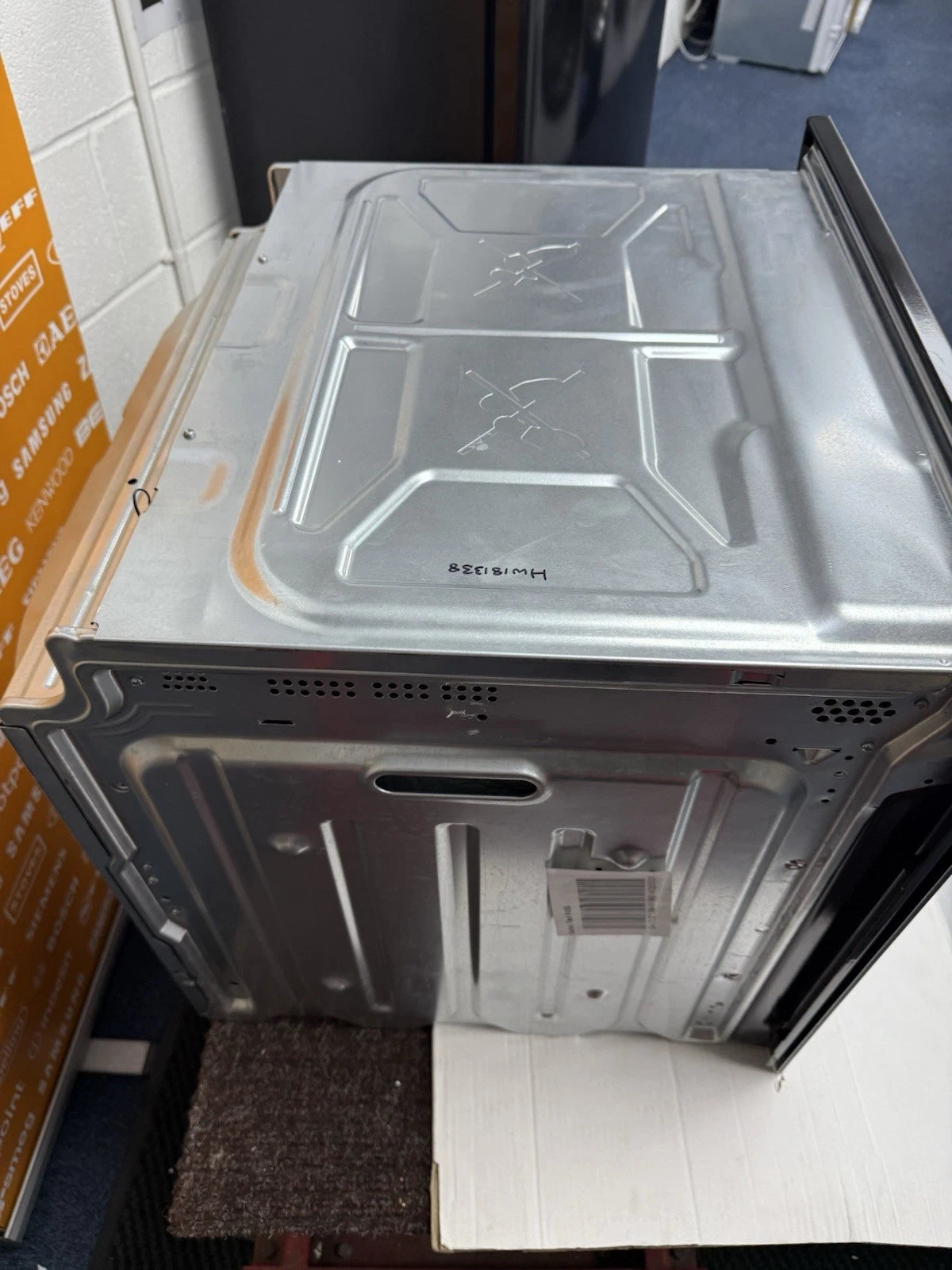 Zanussi ZOPNX6K2 Electric Single Oven with Pyrolytic Self Cleaning in Black - A+ Rated Showroom Photo top of oven casing and left side panel