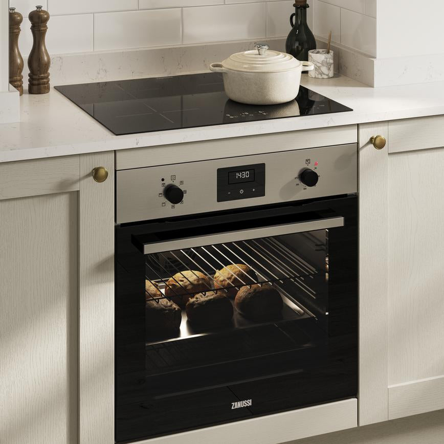 Zanussi Series 20 ZOHNX3X1 Electric Single Oven in Stainless Steel stock photo in cabinet