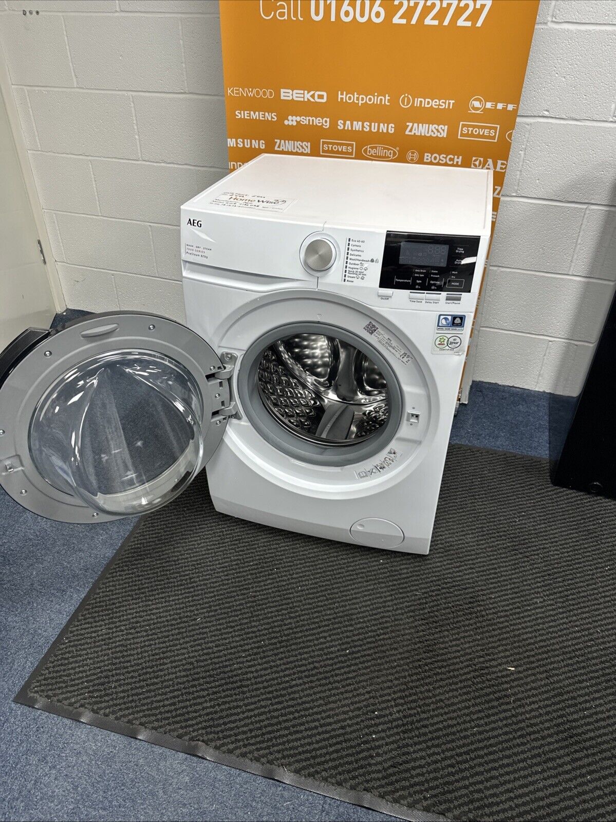 AEG 7000 ProSteam® LWR7185M4B 8+5KG 1400 Spin Washer Dryer in White - A Rated on Wash - Graded showroom photo door open