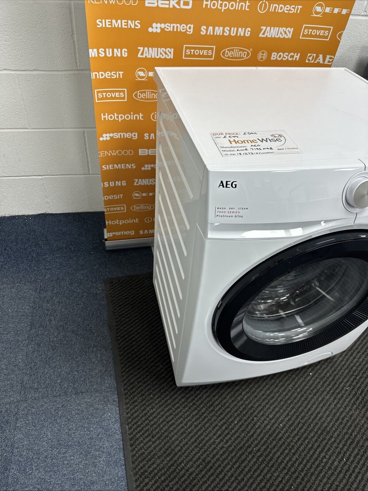 AEG 7000 ProSteam® LWR7185M4B 8+5KG 1400 Spin Washer Dryer in White - A Rated on Wash - Graded showroom photo front and left panel