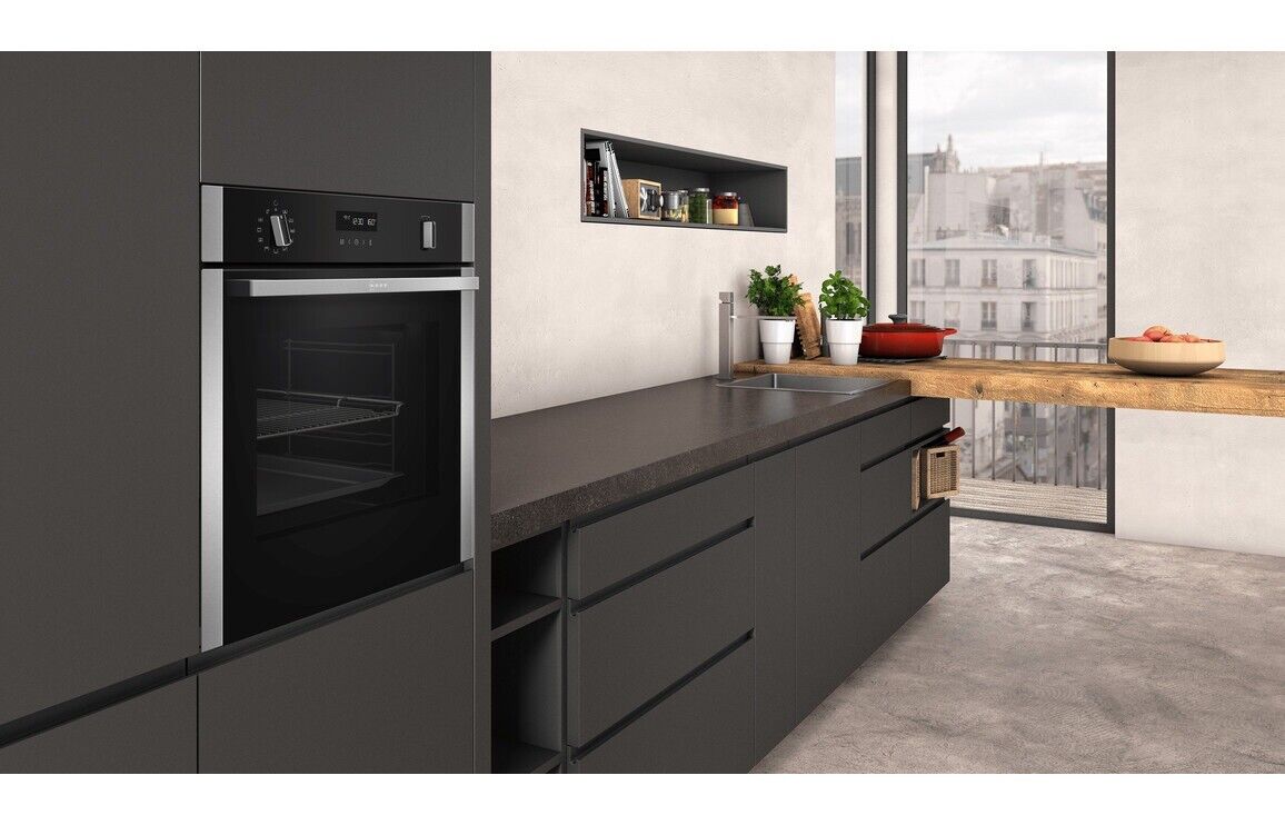 NEFF N50 B2ACH7HH0B Wi-Fi Connected Built In Electric Single Oven with Pyrolytic Self Cleaning - Stainless Steel - A Rated stock fitted in a kitchen