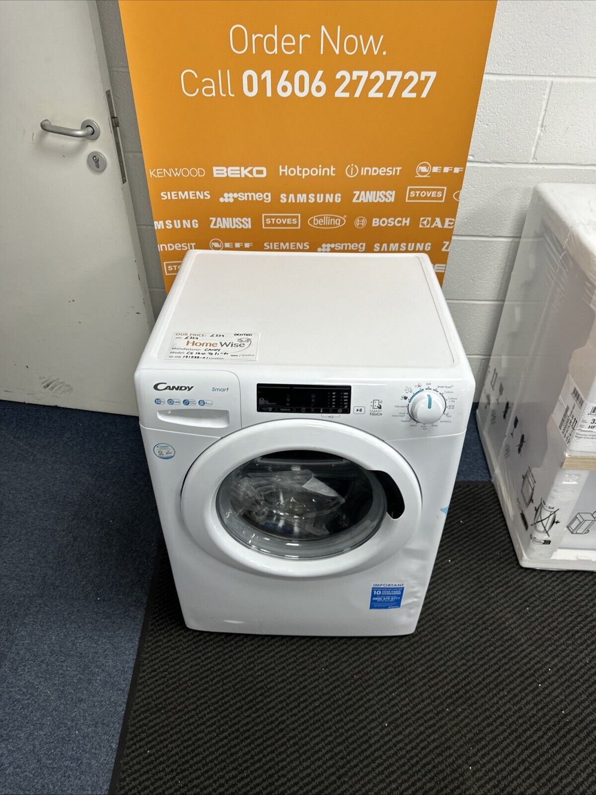 Candy CS1410TE/1-80 10kg 1400 Spin Wi-Fi Enabled Washing Machine in  White - Graded showroom photo lookig down on appliance