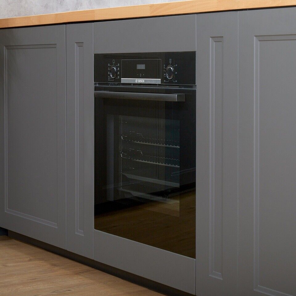 Bosch HBS534BB0B Electric Single Built In Oven in Black stock photo under counter installed