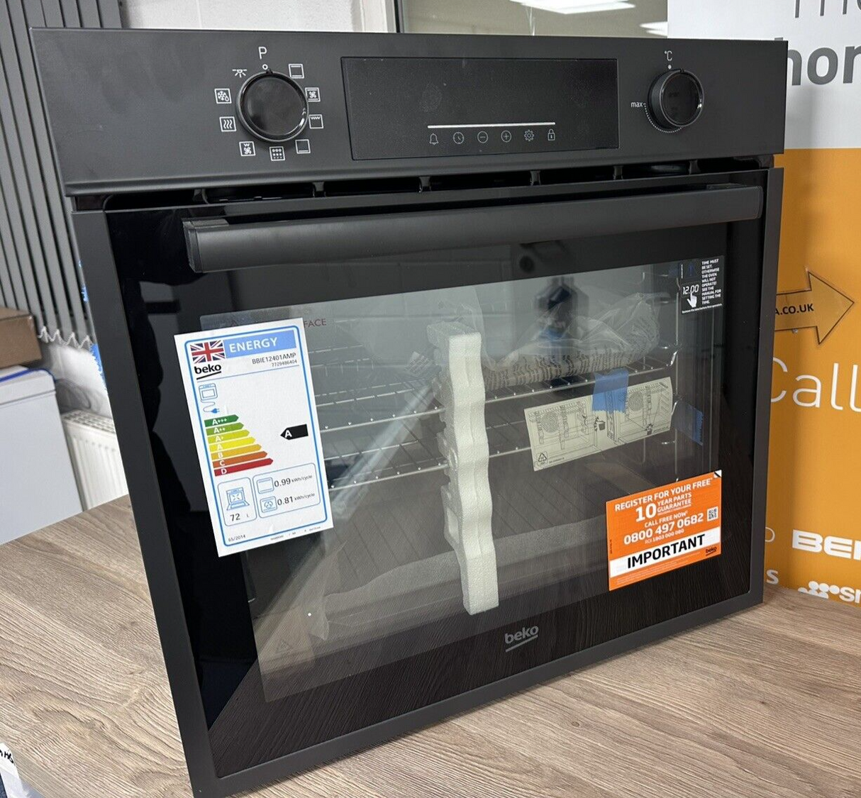 Beko BBIE12401AMP Built In Electric Single Oven with Pyrolytic Self in Cleaning in Matt Black Angled Front showroom photo