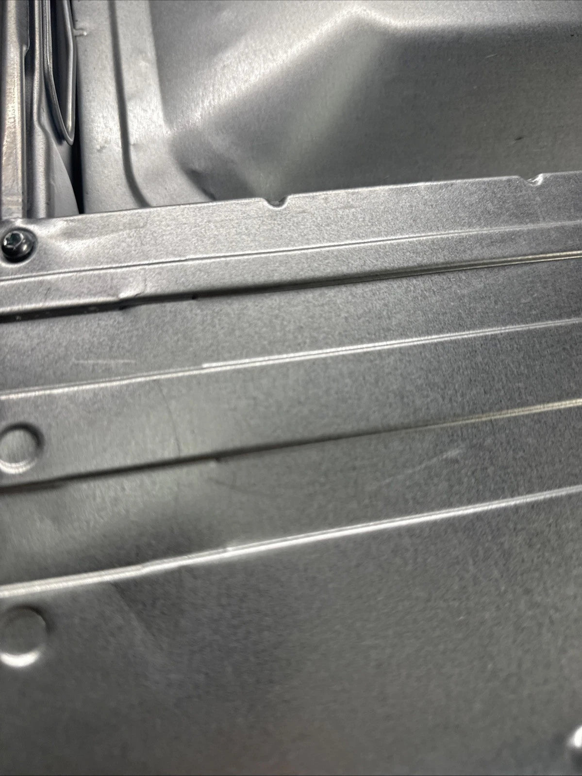 AEG BSX23101XM (80) 6000 Series SurroundCook Electric Single Oven - Stainless Steel - A Rated - 13 Amp Plug from HomeWise Appliances shop photo close up of the oven showing scuff marks on the outer casing