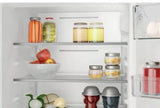 Hotpoint HTC18 T112 UK 70/30 No Frost Integrated Fridge Freezer with Sliding Hinge - E Rated from HomeWise Appliances. Stock photo close up of contents on the fridge shelves