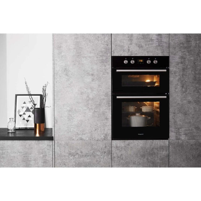 Hotpoint Series 2 DD2 844 C BL Double Built-in Oven in Black - A/A Rated from HomeWise Appliances stock photo of oven in a kitchen wall display