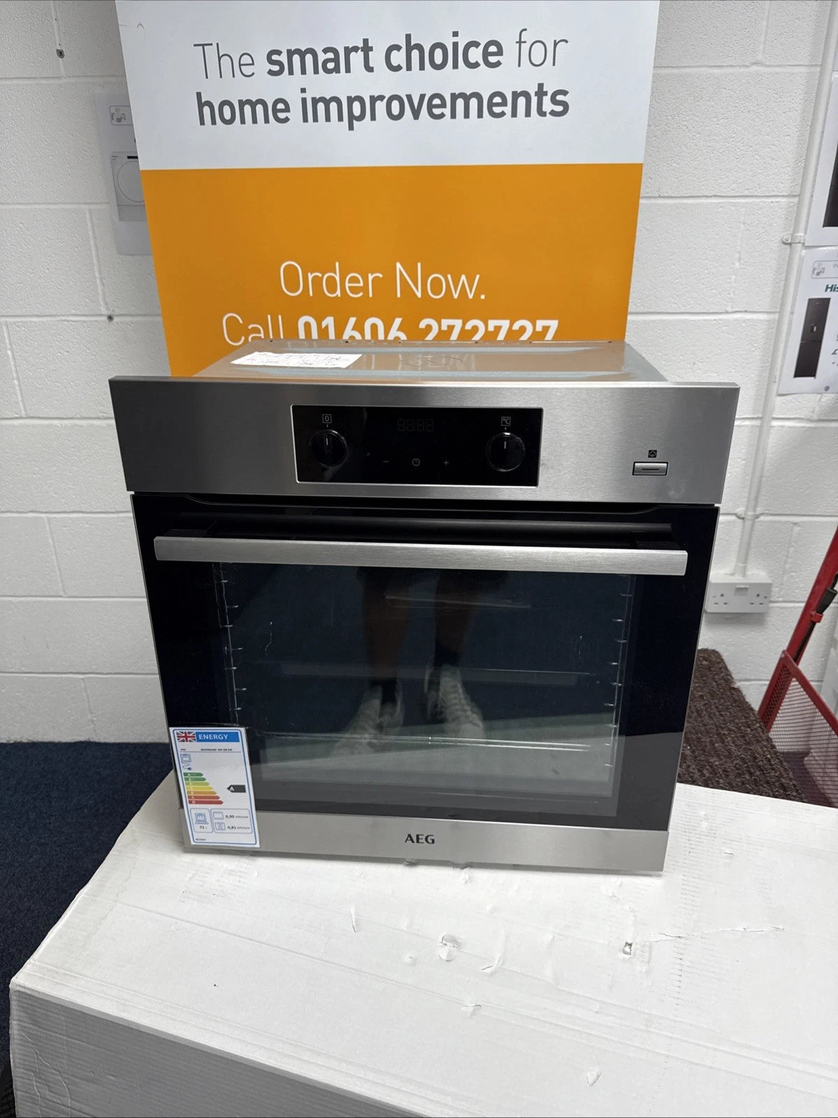 AEG BES356010M Single Oven from HomeWise in front of sales banner call 01606 272727