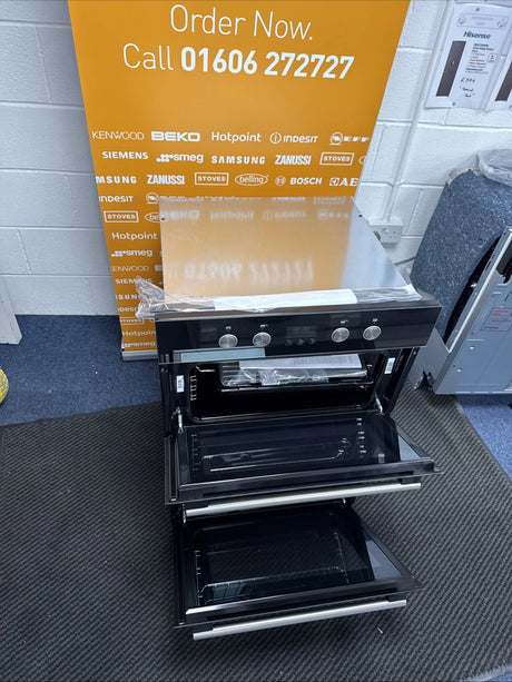Hotpoint Series 2 DD2 844 C BL Double Built-in Oven in Black - A/A Rated from HomeWise Appliances shop photo oven with doors open. in front of a call to action banner - Order Now Call 01606 272727