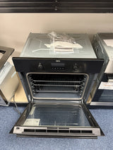 AEG BPK355061B (20) Electric Built-In Single Oven with Pyrolytic Self Cleaning in Black - A+ Rated from HomeWise Appliances. Shop photo of oven on show stand with the door open showing shelves and tray in cavity from above.