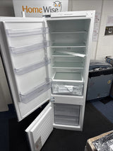 Bosch Series 2 KIV87NSE0G (09) 270 Litre 70/30 Integrated Fridge Freezer - E Rated from HomeWise Appliances. shop photo with doors open showing the interior.