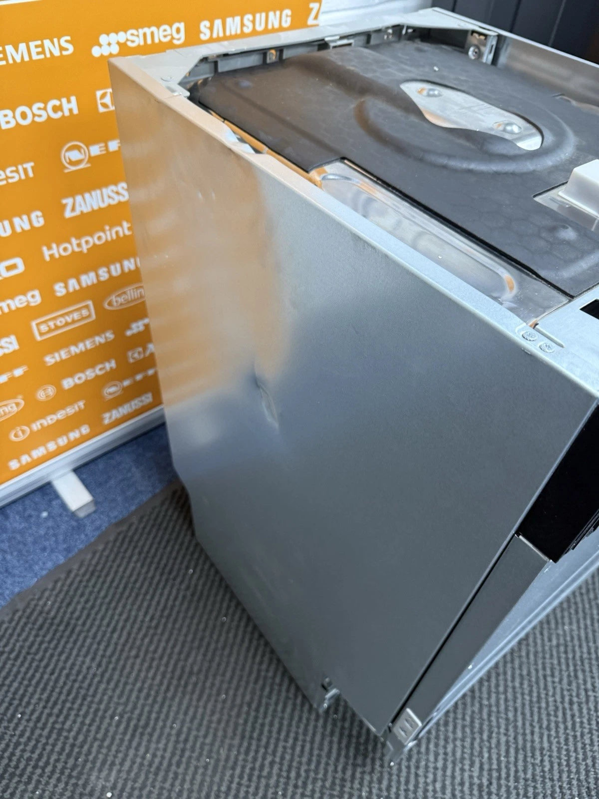 AEG FSX51407Z Series 5000 AirDry 45cm Integrated Slimline Dishwasher with Black Control Panel, F Rated from HomeWise Appliances. Shop photo of left side panel of the outer casing,