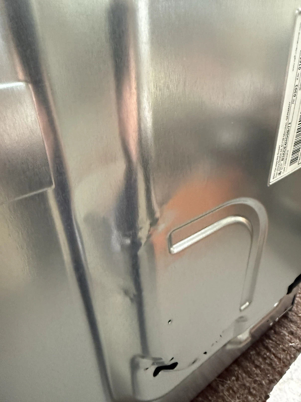 Neff B3ACE4HG0B Slide & Hide® Electric Single Oven in Graphite Grey - A Rated (60) Showroom photo small minor dent on the rear of the outer casing